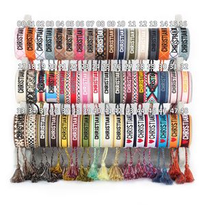 Bracelets d'<span class=keywords><strong>amitié</strong></span> ajustables en corde de coton brodée avec pompons, faits à la main, par LUCY Jewelry – Vente en gros - Product Image 5