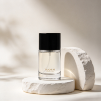 Flacon de parfum en verre rond transparent de 50 ml avec pompe pulvérisatrice, conteneur de parfum, emballage cosmétique avec logo personnalisé