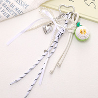 Accessoires de mode suspendus pour filles Porte-clés en peluche en corde tressée Crochet avec nœud de fruits Charm de sac en ruban de perles