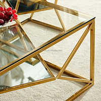 Table basse de style moderne au design moderne pour hôtel, ensemble d'intérieur avec haut en verre ou en marbre blanc, en acier inoxydable