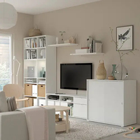 Ensemble de meubles de salon blancs avec console TV modulaire, bibliothèque à cubes ouverts, table basse ronde de rangement, canapé 2 places en tissu