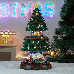 Aldea Animada de Plástico con Árbol de Navidad que Sube y Baja y Tren Giratorio con Luz LED y Música Decoración Navideña - Product Image 3