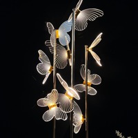 Lampadaire solaire LED papillon de luxe en gros avec 6/9 têtes pour la décoration de couloirs de mariage