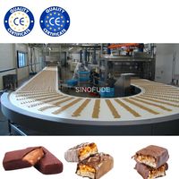 Chaîne de production industrielle de barres protéinées, de barres énergétiques, de nougat et de barres chocolatées (type Snickers) pour la fabrication en gros de produits nutritifs et sains