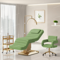 Lit de massage de luxe avec base dorée, commande au pied, 3 moteurs et lumière LED pour salon de beauté