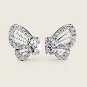 Boucles d'oreilles Ailes Luminelle mettant en vedette des silhouettes incurvées gracieuses avec des accents étincelants qui capturent la lumière et ajoutent une touche de magie - Product Image 1