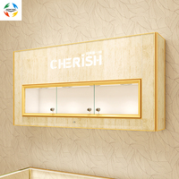Vitrine en verre éclairée par LED en forme de cœur pour bijoux, présentoir mural de haute qualité pour montres et produits de boutique