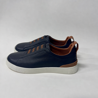 Chaussures plates en cuir véritable pour hommes, style business-casual ; l'usine accepte les commandes OEM ; matériaux et couleurs personnalisables.