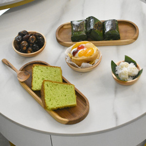 Une assiette ovale minimaliste élégamment conçue, fabriquée en bois de teck massif à 100 %, pour chaque expérience culinaire moderne. - Product Image 3