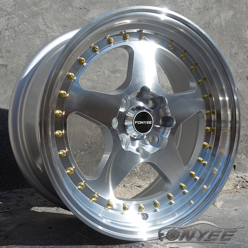 Cara/borde de máquina plateada + remache dorado