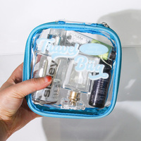 Trousse de Toilette de Voyage Transparente Imperméable à Motif Lettres Tendance en PVC avec Fermeture Éclair et Logo Personnalisé pour Cosmétiques et Maquillage