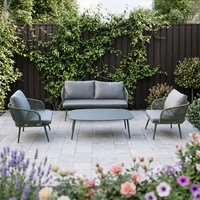 Ensemble de canapés de jardin en rotin moderne et durable 4 places avec mobilier tressé résistant aux UV pour usage extérieur dans les cours de villas et les parcs