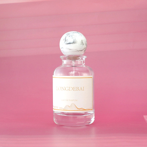 Wholesale Custom Clear Matte Round Perfume Spray <b>Bottles</b> 30ml 50ml 100ml Eco-friendly <b>Empty</b> <b>Glass</b> <b>Bottle</b> with Marble Cap - Product Image 1