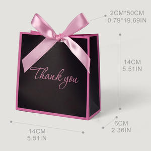 กระเป๋าช้อปปิ้งกระดาษคราฟท์สีดำหูจับริบบิ้นหรูหราบรรจุภัณฑ์บูติกเคลือบ UV สามารถปรับแต่งโลโก้ของคุณเองได้ - Product Image 2