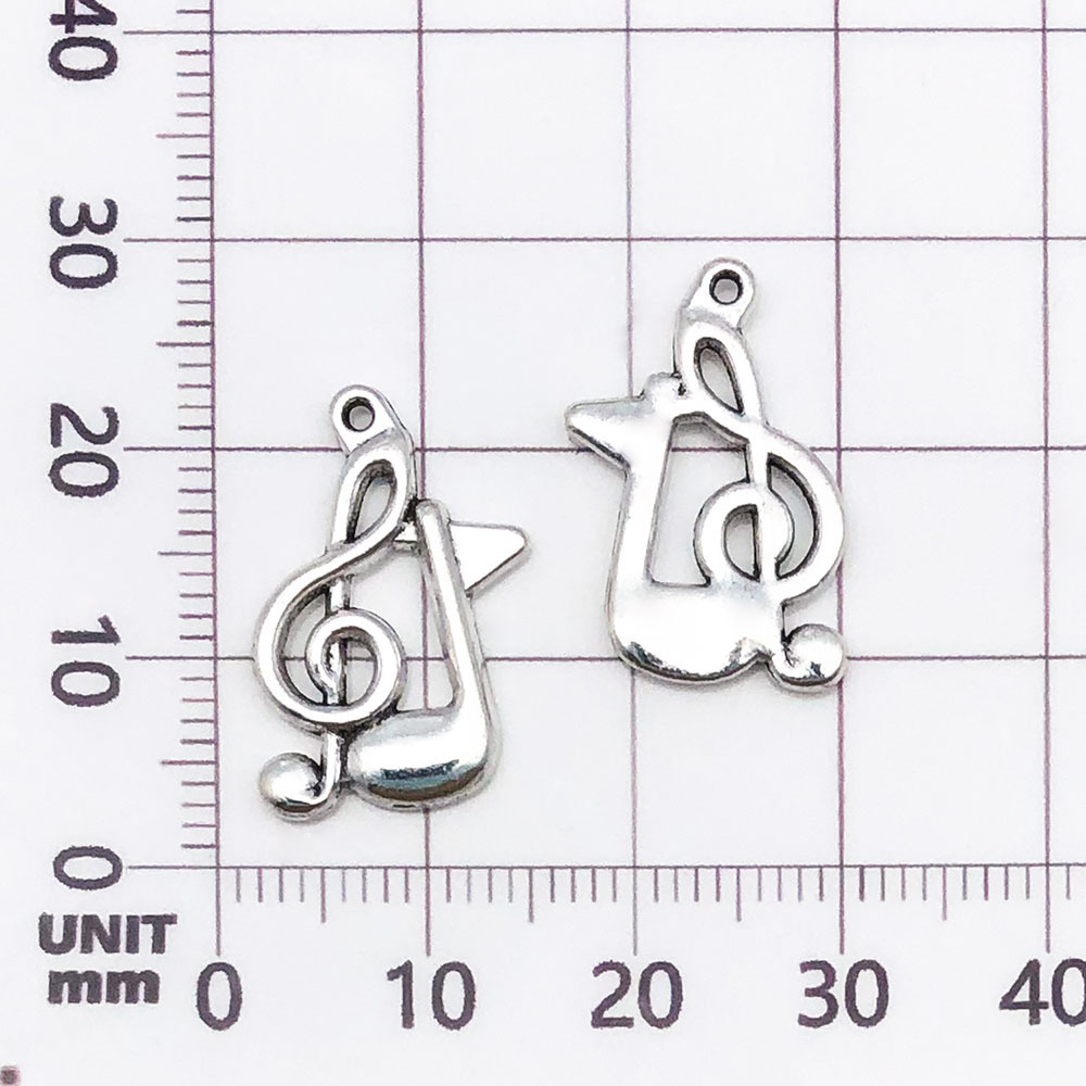 Une note de musique antique en argent - 1,2g - 17*21mm - 8450