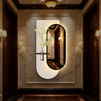 Décoration Murale LED en Grès avec Miroir et Plantes Artificielles – Peinture Murale Lumineuse Moderne pour Maison et Hôtel (Vente en Gros)