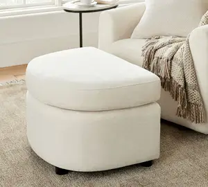 Muebles de sala de estar blanco crema pequeño acolchado redondo terciopelo copetudo reposapiés Gideon otomano con almacenamiento