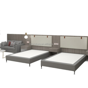 ชุดเฟอร์นิเจอร์ห้องนอนคู่โรงแรม 3 ดาวสมัยใหม่ เตียงเดี่ยวสองเตียง โครงไม้ MDF หัวเตียงหุ้มเบาะ โต๊ะข้างเตียง เป็นมิตรกับสิ่งแวดล้อม - Product Image 1