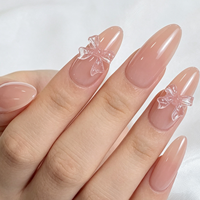 Vente en gros de faux ongles personnalisés à étiquette privée, forme amande, couleur nude rose, nœud 3D, finition brillante