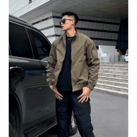 Blouson bomber noir à col montant zippé pour homme, coupe oversize, style streetwear décontracté avec poignets côtelés