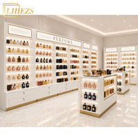 Solution de fabrication sur mesure de vitrines de parfumerie professionnelles modernes et luxueuses, design de présentoirs à parfums blancs