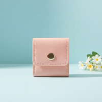 Sac à bijoux portable en microfibre avec fermeture à bouton, style sac à main européen-américain, pour bagues et accessoires de voyage