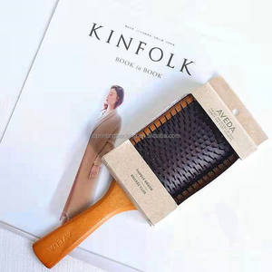 Cajas de embalaje de papel de lujo con logotipo personalizado Laminación mate Revestimiento UV en relieve para cepillos de pelo redondos grandes - Product Image 1