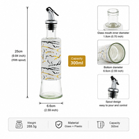 Bouteille Distributrice d'Huile en Verre 300ml avec Bec Verseur en Acier Inoxydable et Coque Décorative en Plastique – Idéale pour l'Huile d'Olive et le Vinaigre en Cuisine et à la Maison