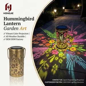 Linterna solar para decoración colgante de exterior, linterna cilíndrica hueca de metal con diseño de colibrí, con proyección colorida, IP44, resistente <span class=keywords><strong>al</strong></span> agua, para patio - Product Image 1