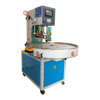 Machine de gaufrage et de soudage de semelles de chaussures à table rotative haute fréquence