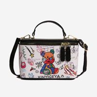 Nouveau sac seau fourre-tout à fermeture éclair pour filles, imprimé ours en peluche et graffiti, sac à bandoulière polyvalent au design de niche, sac cosmétique à porter en travers du corps
