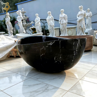 Baignoire en marbre noir Papillon en pierre naturelle sculptée à la main et polie à l'intérieur, en marbre Nero Margiua massif