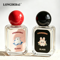 Botol Parfum Kaca Mini Murah Pabrik 30ml 50ml 100ml Botol Parfum Bulat Transparan Kosong dengan Pompa Semprot dan Tutup Bola Berwarna