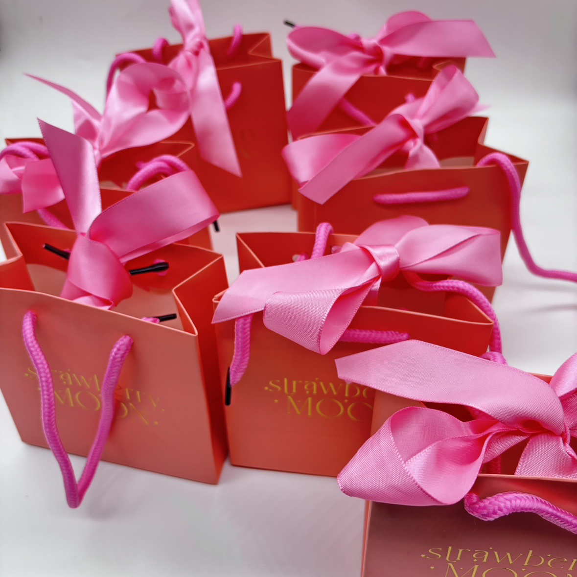 personalized pink and gold paper bags with logo
