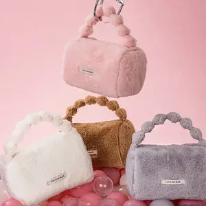 Wholesale travel skincare storage bags faux rabbit fur small handheld plush cosmetic bag for women
