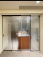 Porte coulissante en verre à cadre ultra-fin en aluminium, cloison intérieure avec système d'interverrouillage pour bureau