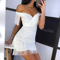 Robe moulante sans manches pour femme Robes d'été blanches à franges et pompons