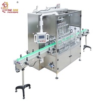 Machine de remplissage automatique à quatre têtes avec pompe à engrenages numérique servo et couvercle de protection pour liquides visqueux, sauces, lotions et huiles