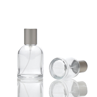 Sortie d'usine bouteille de parfum de cylindre en verre vide 50ml pompe pulvérisateur clair emballage Transparent approvisionnement ponctuel