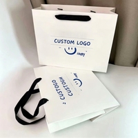 Sac cadeau personnalisé en carton rigide avec poignées torsadées, emballage de marque premium recyclable pour bougies et cadeaux artisanaux