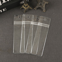 Fabricant fournisseur de sac d'étiquettes de vêtements en PVC étanche étiquette de col à ouverture plate sac en plastique épais transparent pour vêtements