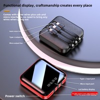 Vente en gros de banque d'alimentation portable avec logo personnalisé Capacité de 10000mAh Matériau en PVC Interface d'entrée micro USB Câble intégré 10W LI-Polymer