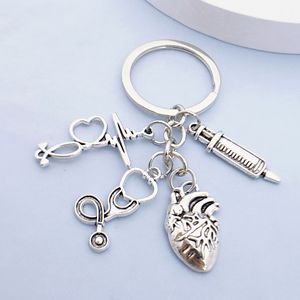 Jeringa, estetoscopio, llavero de corazón, médico, enfermera, herramienta médica, disección de llavero en forma de corazón - Product Image 1
