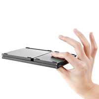 Sıcak satış ultra-ince 61-Key BT katlanabilir klavye yeni ince tasarım Touchpad taşınabilir Mini katlanır Tablet PC