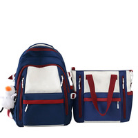 Sac à bandoulière 2 pièces personnalisé pas cher en gros, sac à dos simple pour étudiants du secondaire, sacs d'école avec pendentif