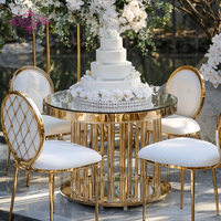 Table à gâteaux ronde moderne en acier inoxydable doré pour le salon ou la salle à manger de mariage en plein air d'hôtel
