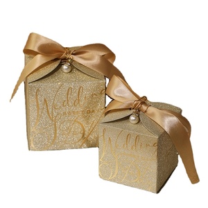 Scatola di caramelle <span class=keywords><strong>d</strong></span>'<span class=keywords><strong>oro</strong></span> di perle di carta all'ingrosso con nastro bomboniere <span class=keywords><strong>per</strong></span> feste di matrimonio confezione regalo di caramelle al cioccolato - Product Image 1