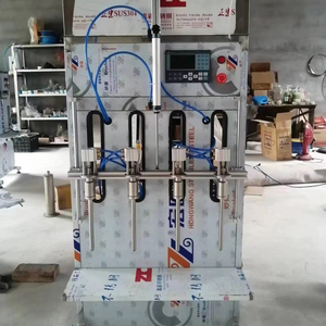 Riempitrice semi automatica/riempitrice quantitativa autofluida/attrezzatura per inscatolamento a pressione pasta di miele - Product Image 1