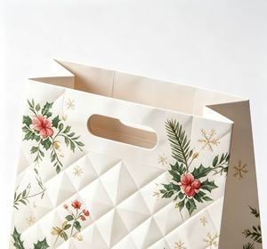 Low MOQ flat bottom thick Kraft paper debossed texture <b>bags</b> with handle for Christmas wrapping gift <b>bags</b> - Product Image 2