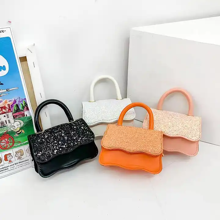 Premium AI Image | There is a small orange purse with a handle on a white  surface generative ai